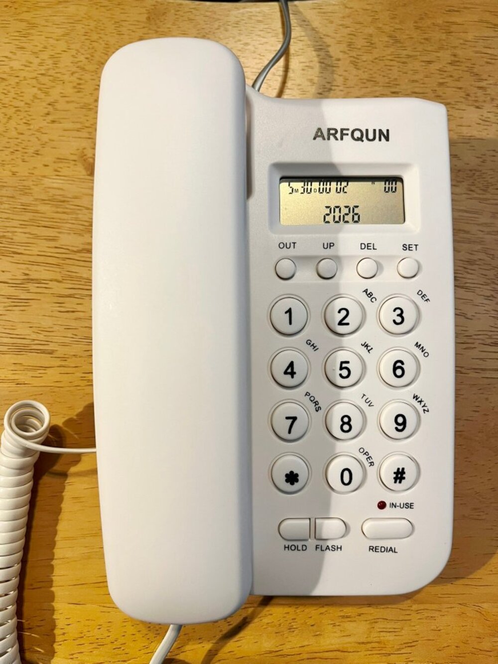 Corded desktop landline phone with caller ID, compact, lightweight